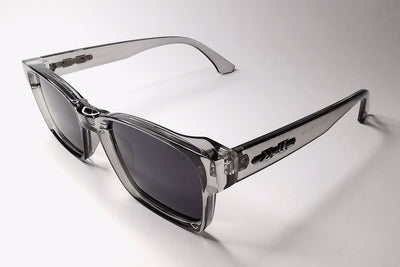 Clear frame sunglasses with dark lenses on a white background