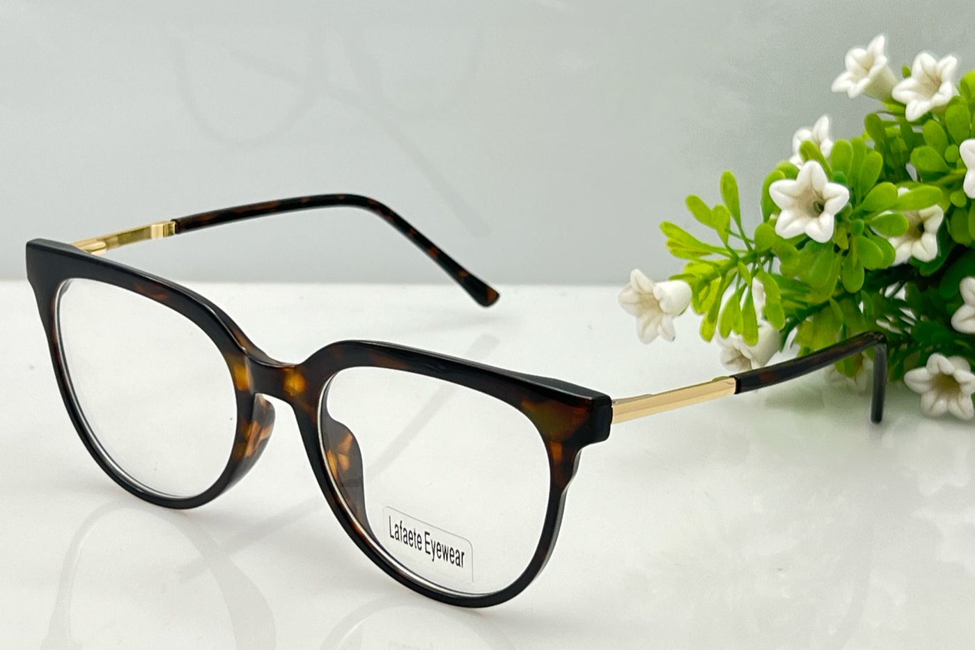 Tortoiseshell eyeglasses with gold accents 